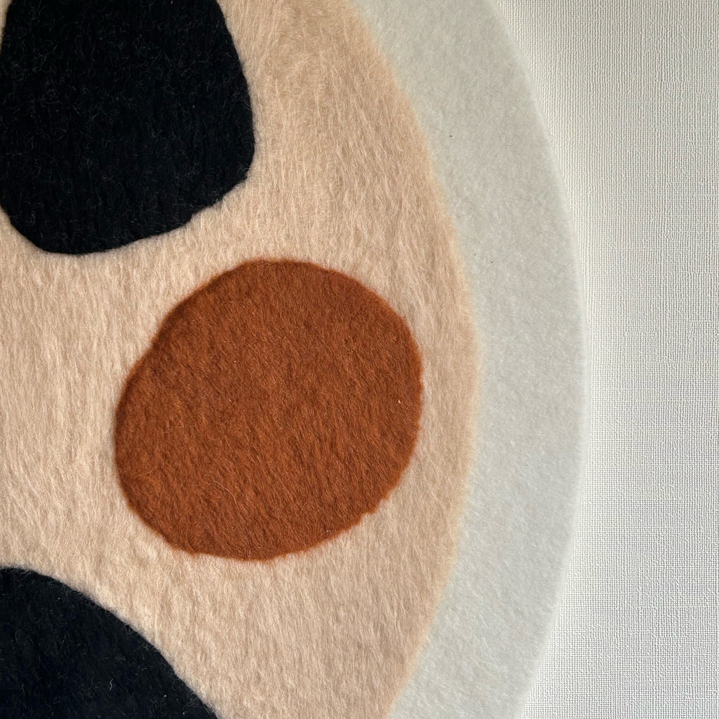 Rond schilderij van wol - Stone